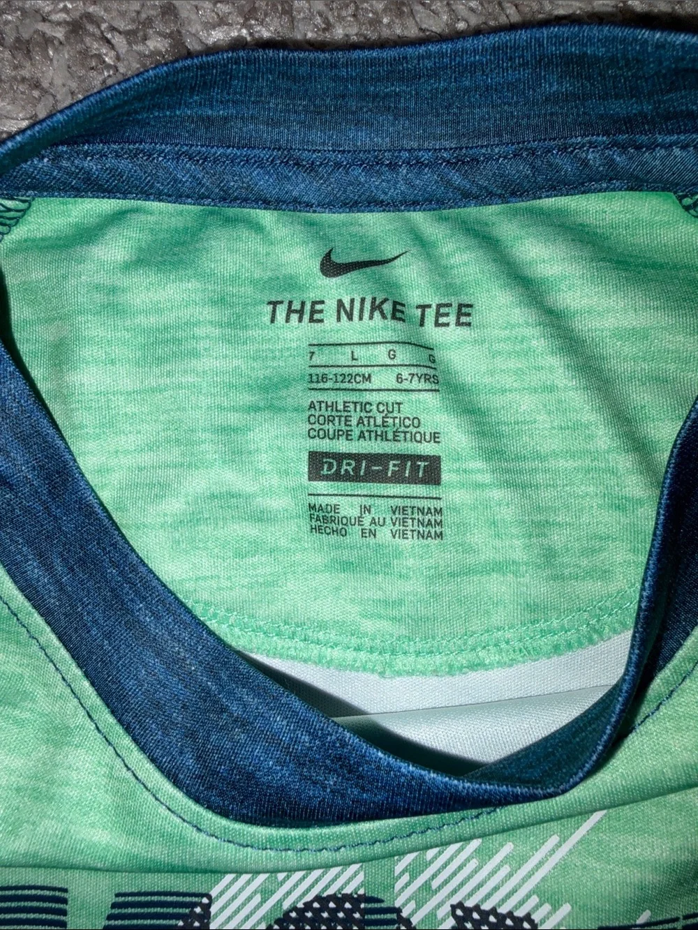 Nike Kids Long Sleeve Raglan Tee in Mint Green and Navy. Football size 6-7